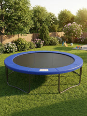 Trampoline with the blue pad fitted in a fenced back garden with shrubs and a child's slide