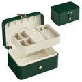 Forest green Songmics travel jewellery case shown open with its lift-out tray, and closed behind