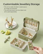 Open laurel green case beside a ring dish, showing removable dividers and the detachable earring board
