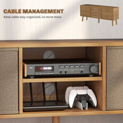 Open shelves holding a stereo receiver and router with rear cable management holes shown