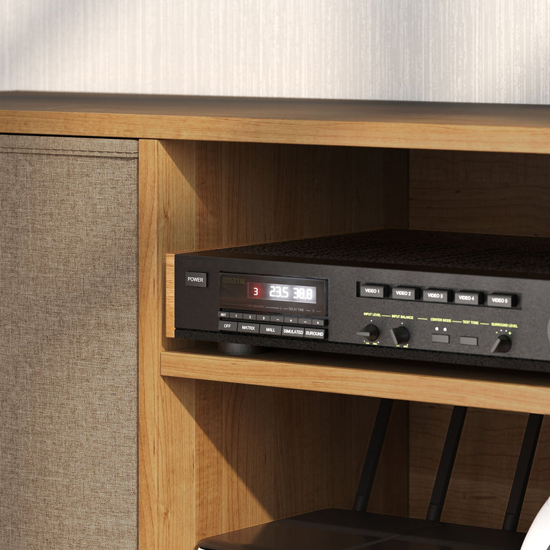 Close-up of the wood-effect shelf with a stereo receiver next to a fabric drawer