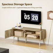 TV stand cupboard door open showing storage space and speaker equipment inside