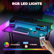 RGB LED panel showing 16 colours and 4 modes with the remote control held in a hand