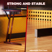 Split image of the Z shaped steel legs and the adjustable foot pads on a wooden floor