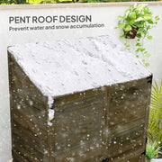 Pent roof panel showing snow sliding off the sloped roof of the green wooden shed