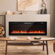 Electric fire on a plaster wall above a wooden coffee table with lamps