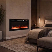 Electric fire on a bedroom wall beside a bed in warm lighting