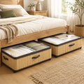 Two HOMCOM bamboo under bed storage boxes with folded clothing beneath a wooden bed