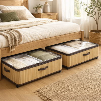 Two HOMCOM bamboo under bed storage boxes with folded clothing beneath a wooden bed