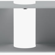 Close-up of the open lower shelf with a pedestal column through the light blue cabinet