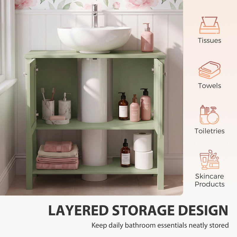 Open green cabinet doors showing toiletries and towels stored around a pedestal sink