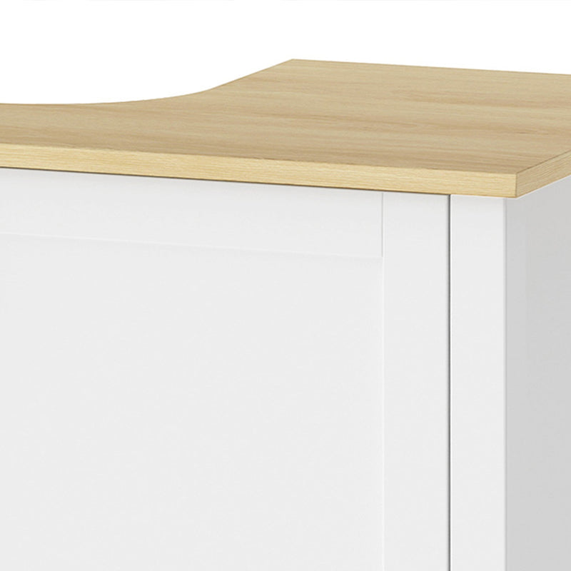 Close-up of the oak-effect top and U-shaped cut-out on the white under sink cabinet