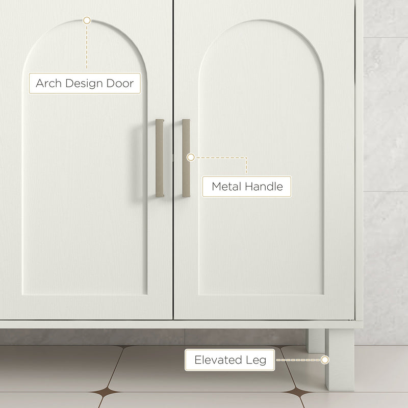 Close-up of the arched doors, metal handles and raised legs on the cream cabinet