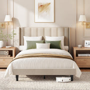 Cappuccino upholstered double bed with a winged headboard dressed in cream and green bedding