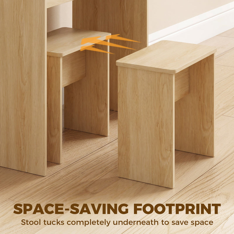 Oak stool tucked completely underneath the vanity desk to save floor space