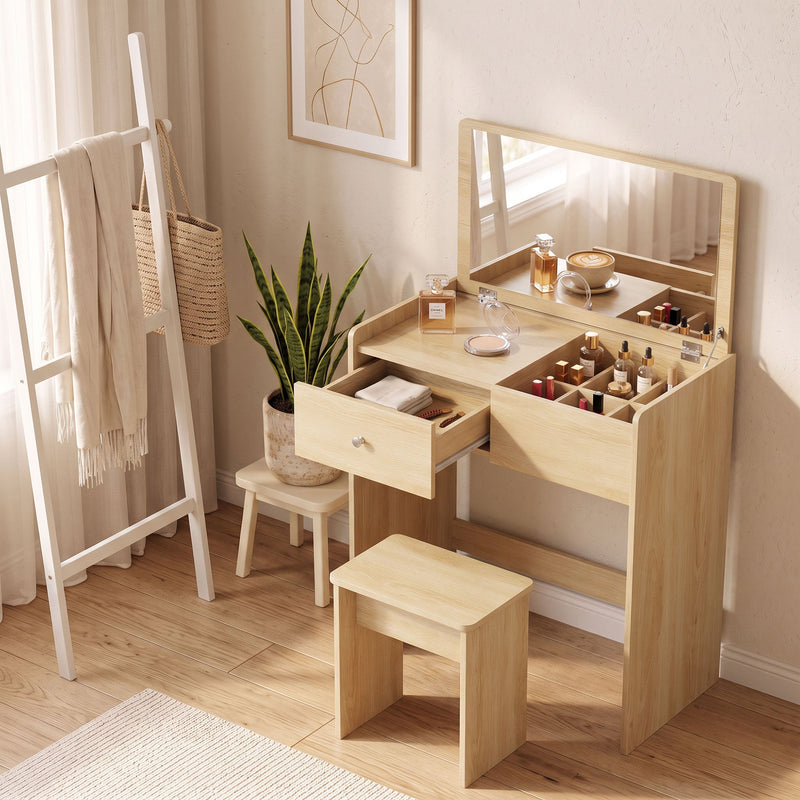 Oak vanity desk styled with cosmetics and the drawer open in a bedroom corner