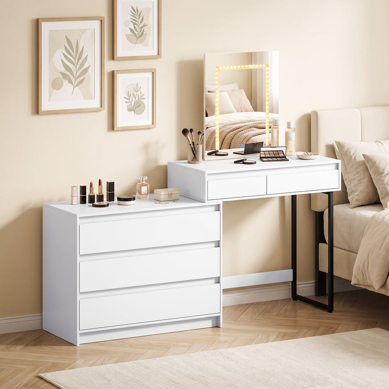White vanity desk with LED mirror lit up in a bedroom setting