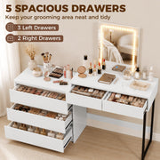 Open drawers of the vanity desk showing cosmetics storage layout