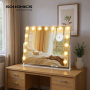 Songmics vanity mirror on a wooden dressing table with LED lights lit