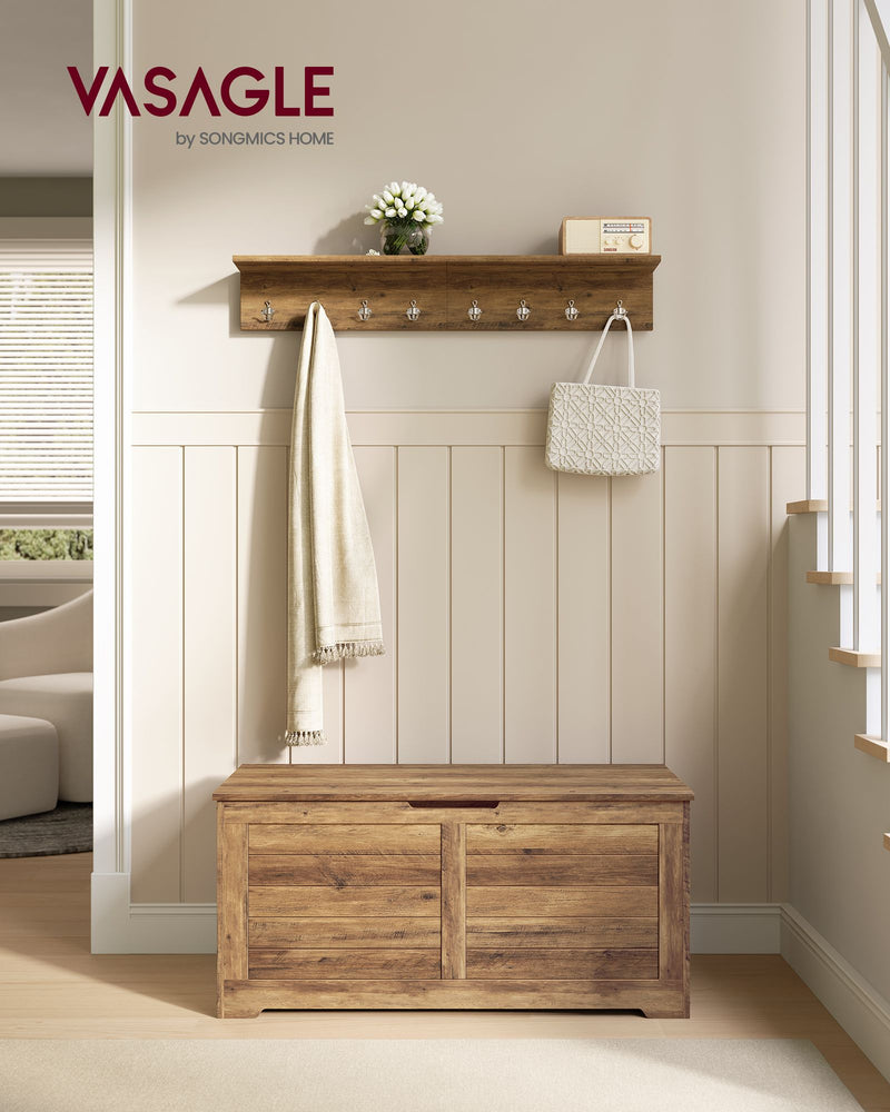 Honey brown Vasagle bench styled in an entryway below a matching wall-mounted hook rail