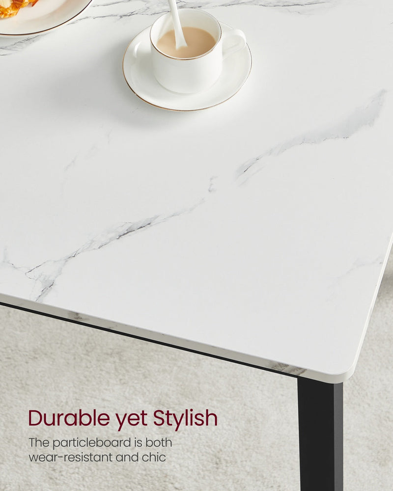 Close-up of the marble-effect particleboard table top with a cup of coffee, captioned Durable yet Stylish