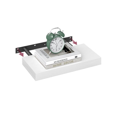Vasagle white floating wall shelf studio shot with a clock and books on top