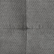 Close-up of grey textured velvet fabric and the seam between cushions