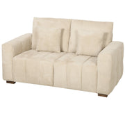 Cream white velvet 2 seater sofa with two pillows and wooden legs, front view on white