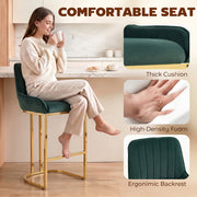 Woman sitting on a dark green velvet bar stool with close-ups of the thick cushion, foam and backrest