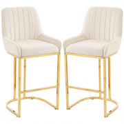 Set of 2 cream white velvet bar stools with gold legs on a white background