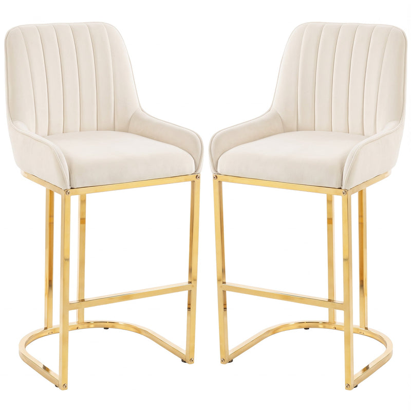 Set of 2 cream white velvet bar stools with gold legs on a white background