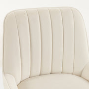 Close-up of the pleated cream white velvet backrest and seat cushion