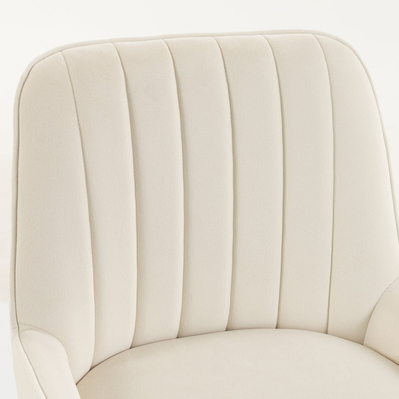 Close-up of the pleated cream white velvet backrest and seat cushion