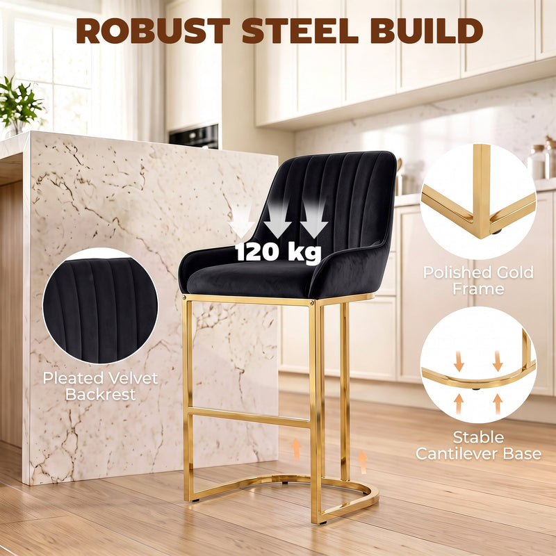 Black velvet bar stool with callouts for 120 kg capacity, pleated backrest, gold frame and cantilever base