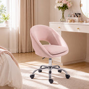 Pink velvet desk chair shown from the back, showing the rounded barrel-style backrest