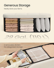 Interior storage compartment of the ottoman bench with folded items and 2 removable dividers