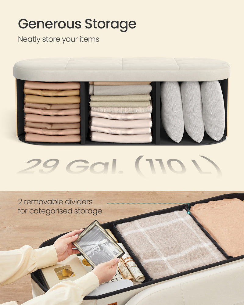 Interior storage compartment of the ottoman bench with folded items and 2 removable dividers