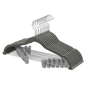 Set of 10 grey velvet trouser hangers stacked with adjustable clips visible
