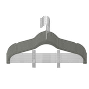 Single grey velvet hanger with swivel hook and two adjustable clips on the bar