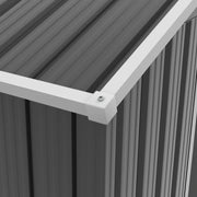 Image of a small grey metal outdoor garden storage shed with apex roof