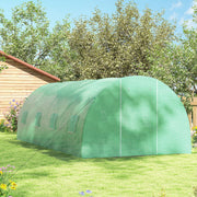 Side view of the polytunnel greenhouse on a lawn with mesh windows along the cover