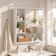White mirror cabinet mounted above a bathroom basin with toiletries and a basket