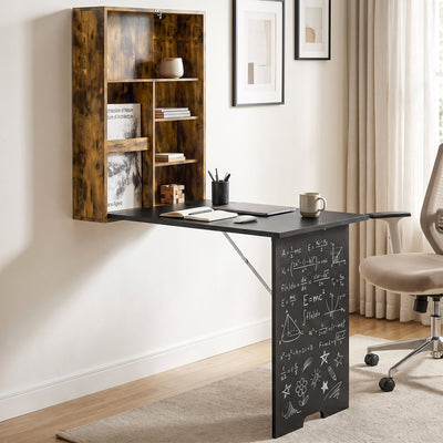 Lifestyle photo of the wall-mounted table open in a home office with a chalkboard message