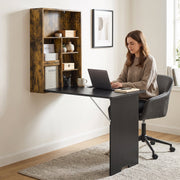 Lifestyle photo of a woman working on a laptop at the open wall-mounted desk
