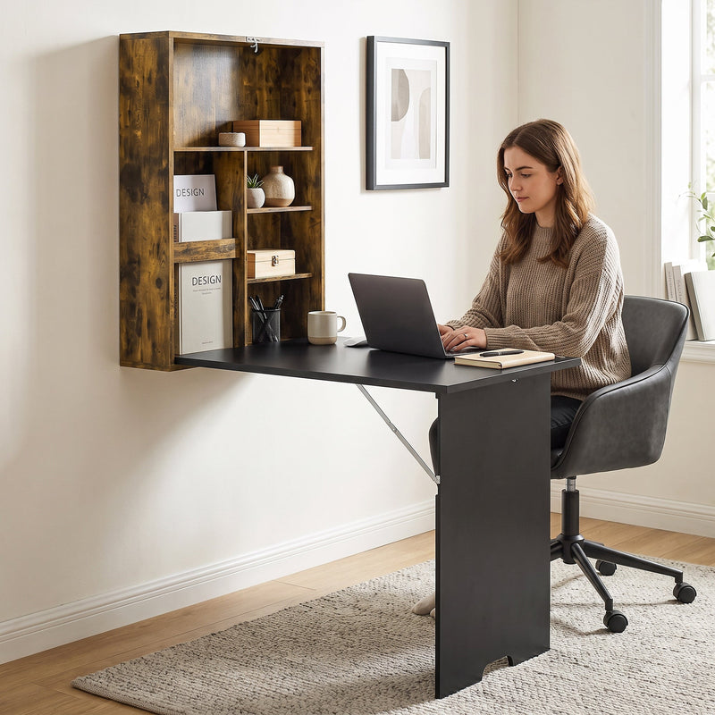 Lifestyle photo of a woman working on a laptop at the open wall-mounted desk