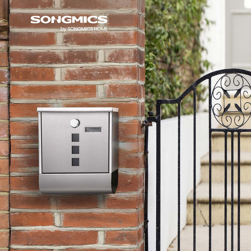 SONGMICS wall-mounted mailbox installed on a brick pillar beside a garden gate