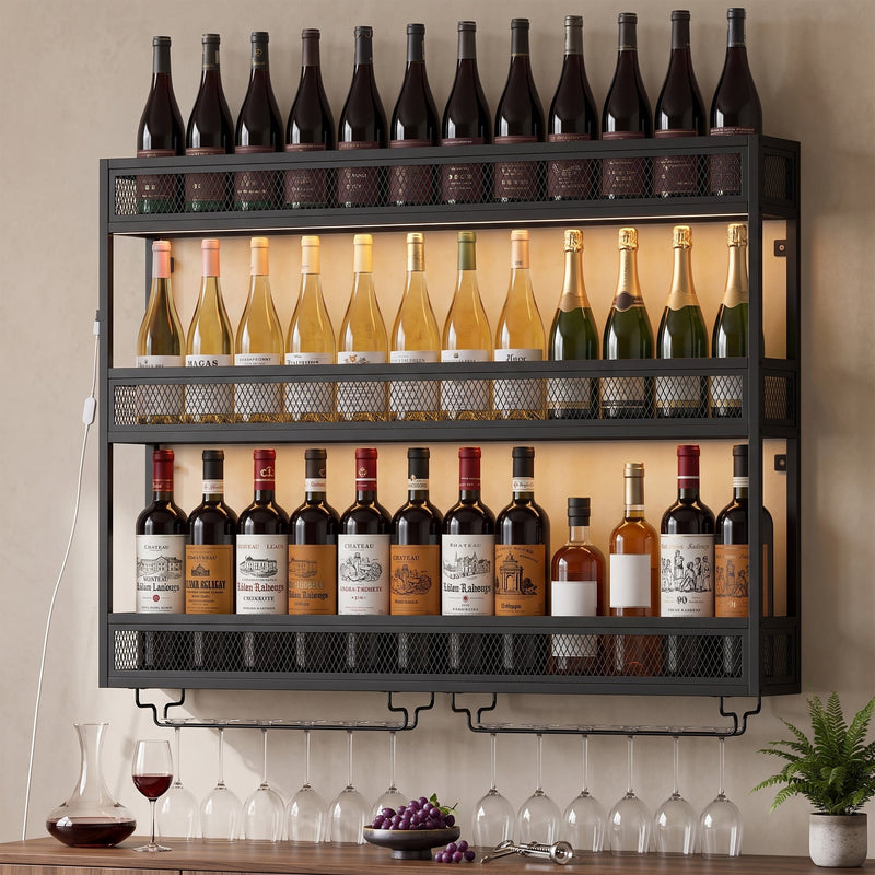 Wine rack filled with red, white and sparkling wine bottles, with glasses, grapes and a decanter below