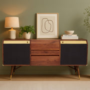 Walnut and brass sideboard styled in a living room setting