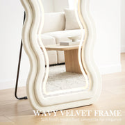 Close-up of the mirror's wavy velvet-feel frame edge