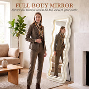 Woman checking her outfit in the wavy full length mirror